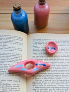 Bague de lecture et pierre d'anxiété Dragon bleu sur fond rose